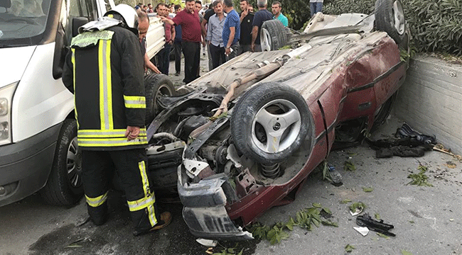 YOLDAN ÇIKAN ARACIN ALTINDA KALDI