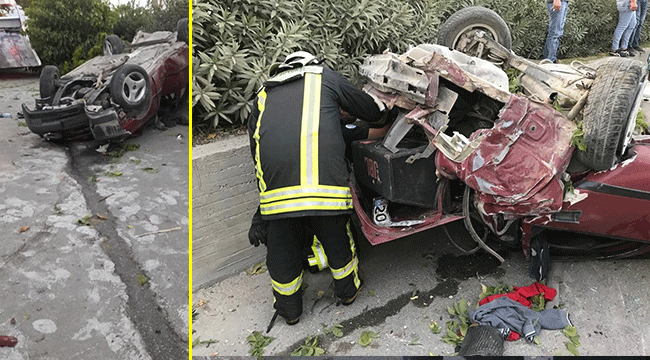 YOLDAN ÇIKAN ARACIN ALTINDA KALDI