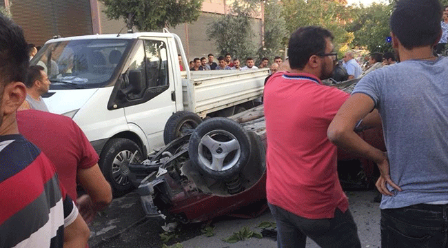 YOLDAN ÇIKAN ARACIN ALTINDA KALDI