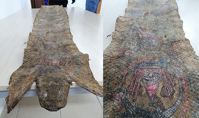 İbranice yazılı çeşitli figürlerin bulunduğu yılan derisi ele geçirildi