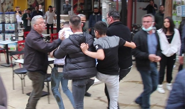 Şehir eşkıyaları önce çocuğu ardından araya giren esnafı tekme tokat dövdü