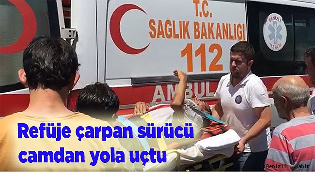 Refüje çarpan sürücü camdan yola uçtu