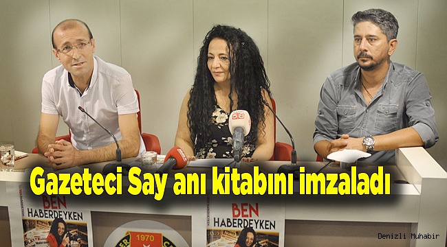 Gazeteci Say anı kitabını imzaladı