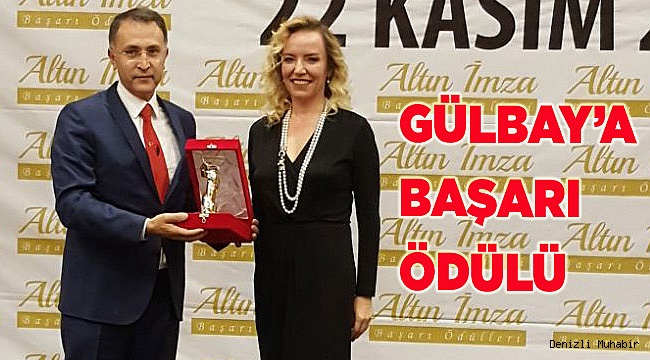 GÜLBAY’A BAŞARI ÖDÜLÜ