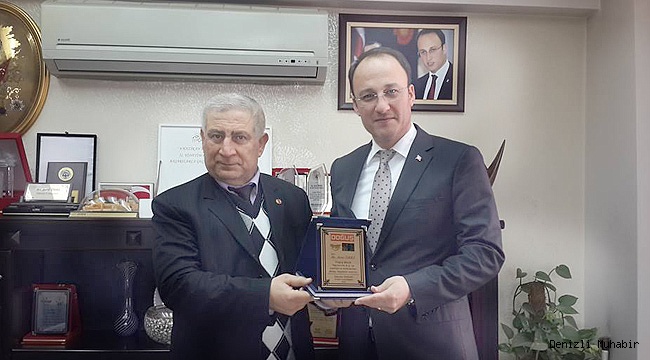 Av.ÖRKİ'YE DOĞUŞ FM'DEN PLAKET