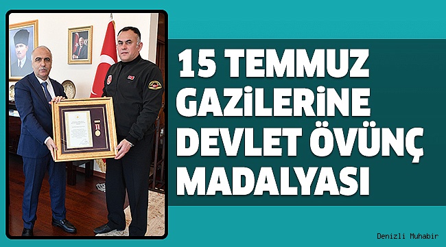 ÖVÜNÇ MADALYALARINI VALİ KARAHAN VERDİ