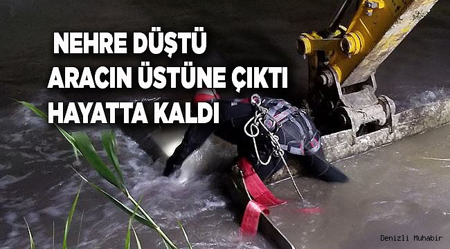 Nehre düşen otomobilin tavanına çıkarak hayatta kaldı