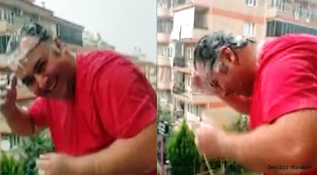 Yağmurda başını şampuanla yıkayan vatandaş ilgi odağı oldu