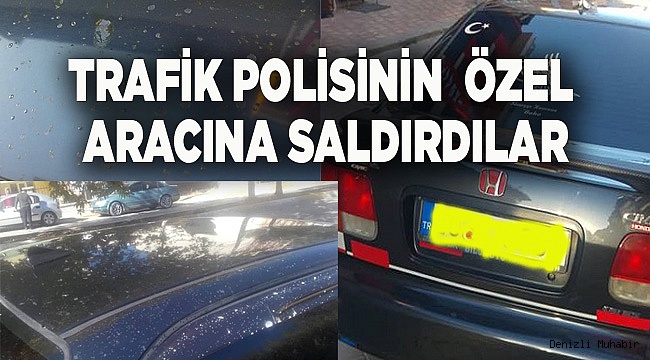 TRAFİK POLİSİNİN  ÖZEL ARACINA SALDIRDILAR
