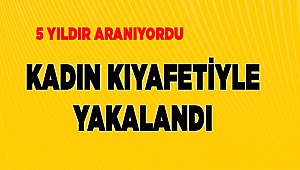 Aranan zanlı, kadın kıyafetiyle yakalandı