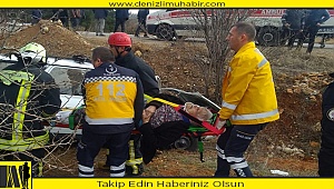 Denizli'de refüje devrilen otomobildeki iki kişiyi itfaiye kurtardı