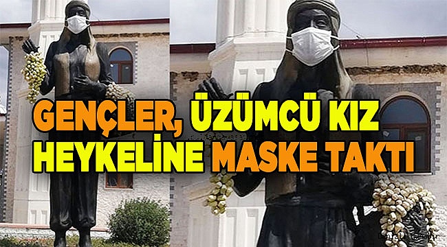 Gençler, üzümcü kız heykeline maske taktı