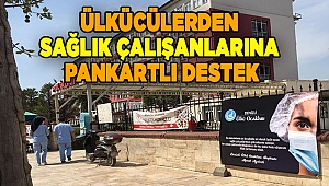 ÜLKÜCÜLERDEN SAĞLIK ÇALIŞANLARINA PANKARTLI DESTEK
