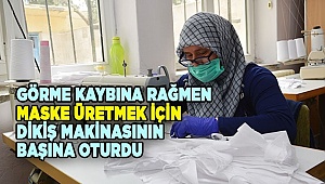 Görme kaybına rağmen maske üretmek için dikiş makinasının başına oturdu