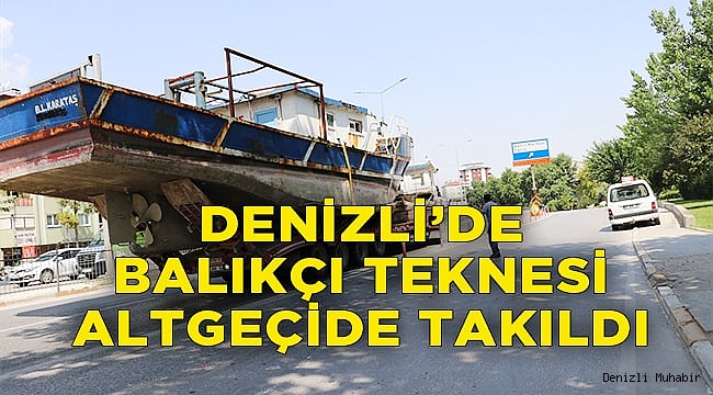 Denizli'de alt geçitten geçemeyen gemi yüklü tır, trafiğin aksamasına neden oldu