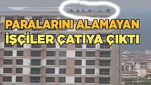 Maaşlarını alamayan işçiler 20 katlı binanın çatısında eylem yaptı