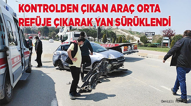 Kontrolden çıkan araç orta refüje çıkarak yan sürüklendi