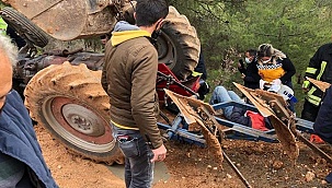Traktörün altında kalan çiftçi ağır yaralandı