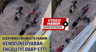 Elektrikli bisikletli kadın kendisini uyaran engelliyi darp etti