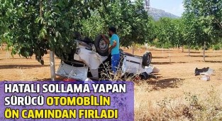 Hatalı sollama yapan sürücü otomobilin ön camından fırladı