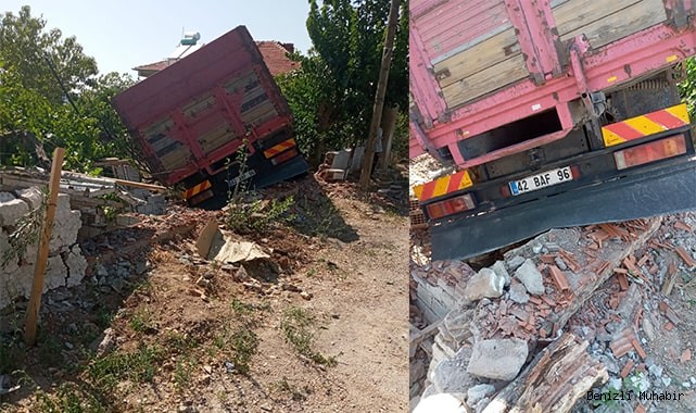 Hatalı sollama yapan tır duvarı yıkıp evin bahçesine girdi