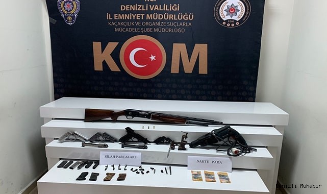 Sahte para ve kaçak silahla yakalandı