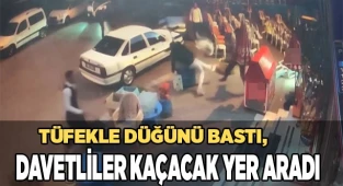 Tüfekle düğünü bastı, davetliler kaçacak yer aradı