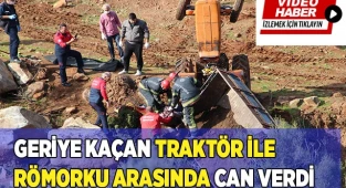 Geriye kaçan traktör ile römorku arasında can verdi