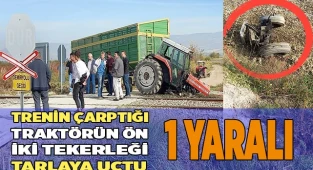 Trenin çarptığı traktörün ön iki tekerleği tarlaya uçtu; 1 yaralı