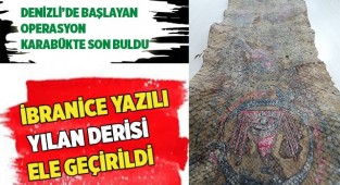 İbranice yazılı çeşitli figürlerin bulunduğu yılan derisi ele geçirildi
