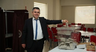 ENVER KİRAZ, GÜVEN TAZELEDİ