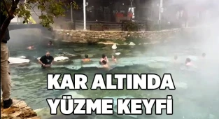Kar altında antik yüzme keyfi