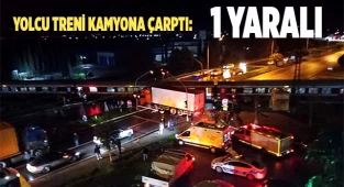 Yolcu treni kamyona çarptı: 1 yaralı