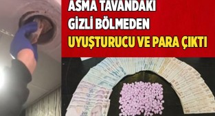 Asma tavandaki gizli bölmeden uyuşturucu ve para çıktı