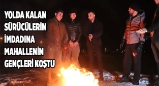 Yolda kalan sürücülerin imdadına mahallenin gençleri koştu