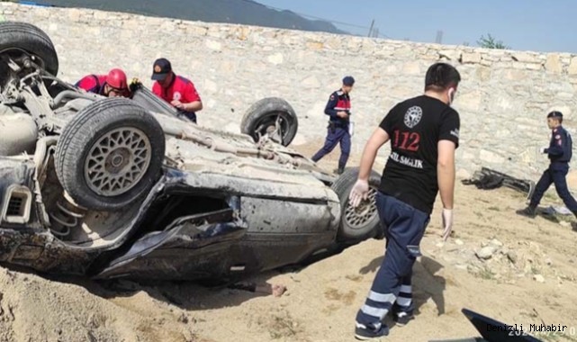 Takla atan otomobilin sürücüsü sıkışarak can verdi