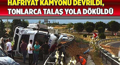 Hafriyat kamyonu devrildi, tonlarca talaş yola döküldü