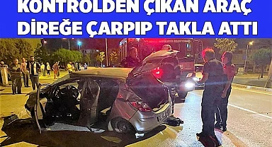 Kontrolden çıkan araç direğe çarpıp takla attı