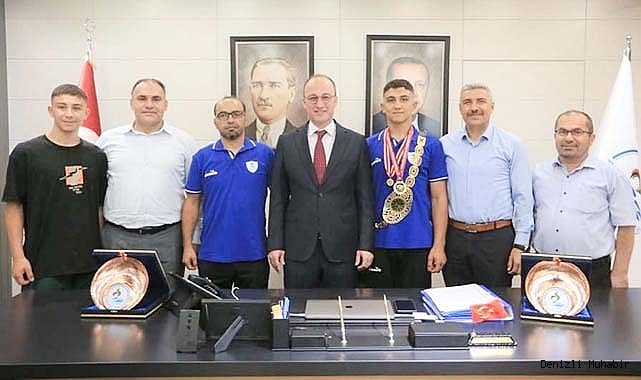 BAŞKAN ÖRKİ, ŞAMPİYON GÜREŞÇİYİ AĞIRLADI