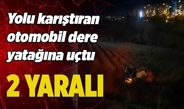 Yolu karıştıran otomobil dere yatağına uçtu; 2 yaralı