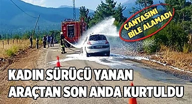 Kadın sürücü yanan araçtan son anda kurtuldu