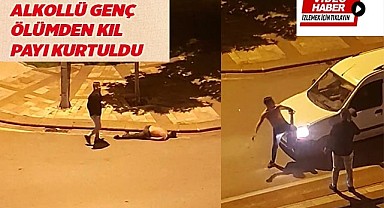 Kendini araçların önüne atan alkollü genç ölümden kıl payı kurtuldu