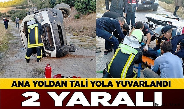 Ana yoldan tali yola yuvarlanan araçtaki 2 kişi yaralandı