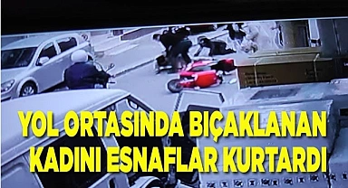 Sokak ortasında bıçaklanan kadını esnaf kurtardı