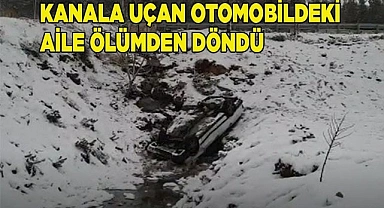 Kanala uçan otomobildeki aile ölümden döndü