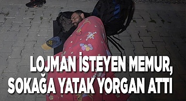 Lojman isteyen memur, sokağa yatak yorgan attı