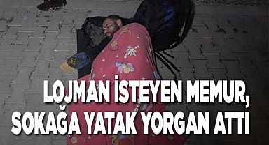 Lojman isteyen memur, sokağa yatak yorgan attı