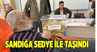 Sandığa sedye ile taşındı