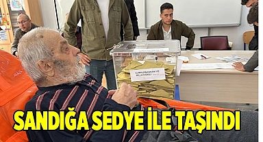 Sandığa sedye ile taşındı