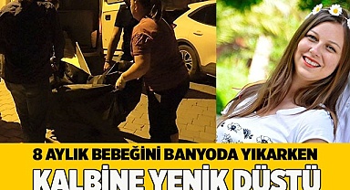 8 aylık bebeğini banyoda yıkarken kalbine yenik düştü